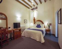 The hotel is set up in an old barrio and the old s The hotel is set up in an old barrio and the old street is turned into a courtyard. The site is said to be haunted by many spirits. One of these is th